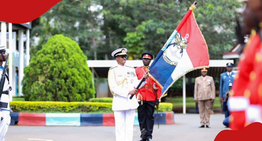 General Charles Kahariri with the Kenya Defence Forces command flag.
