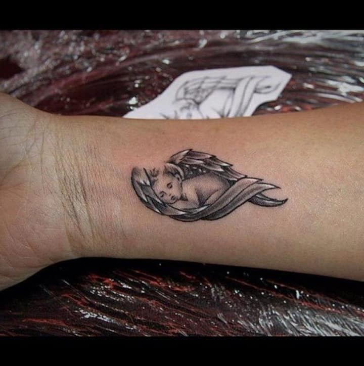 20 cutest wrist angel wings tattoo ideas with their meanings - Tuko.co.ke