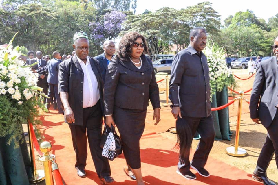 Raila Odinga steps out in customised Kaunda suit at Moi's burial ceremony