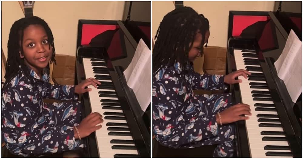 Jabu Mwangi playing the grand piano.