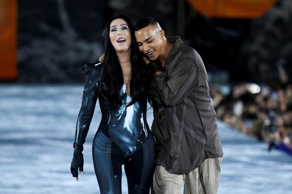 US singer Cher joined French designer Olivier Rousteing on the catwalk as her hit Strong Enough played
