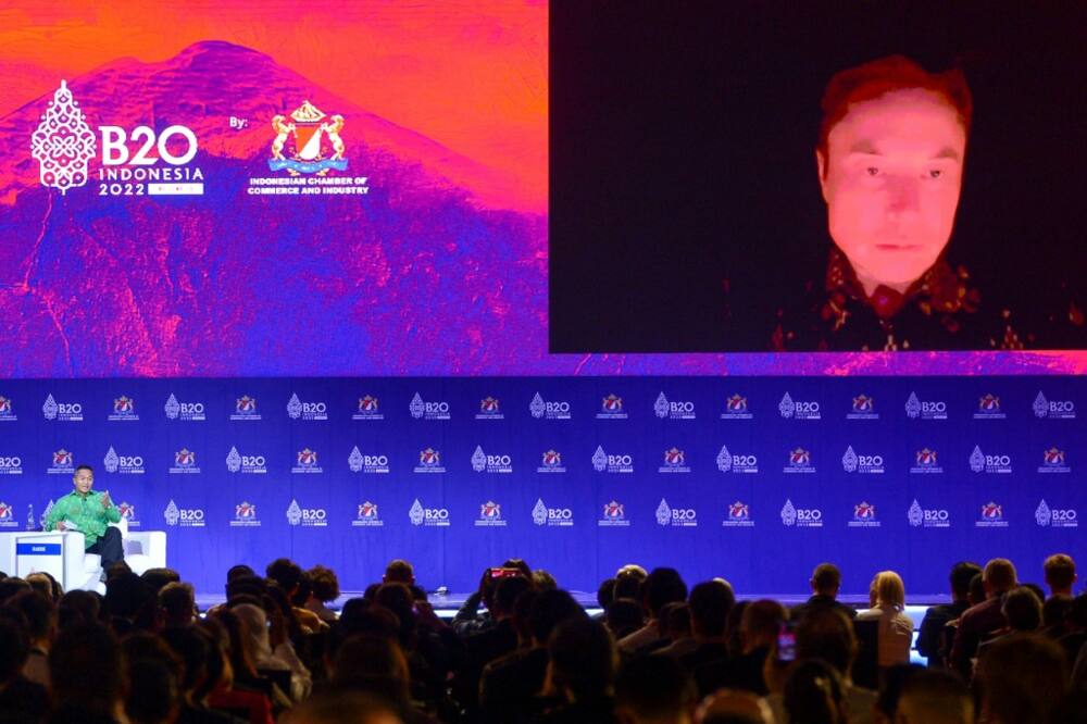 Tesla CEO and Twitter owner Elon Musk offers a vision of the future that includes aliens, tunnels and rocket tourism in a bizarre G20 address