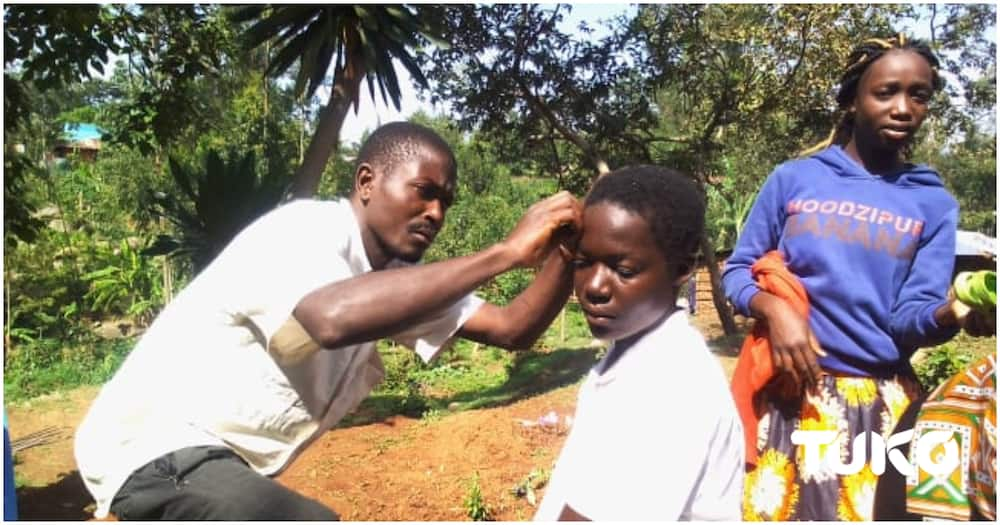 Family members shaving. Photo: Collins Mmbulika/TUKO.co.ke.