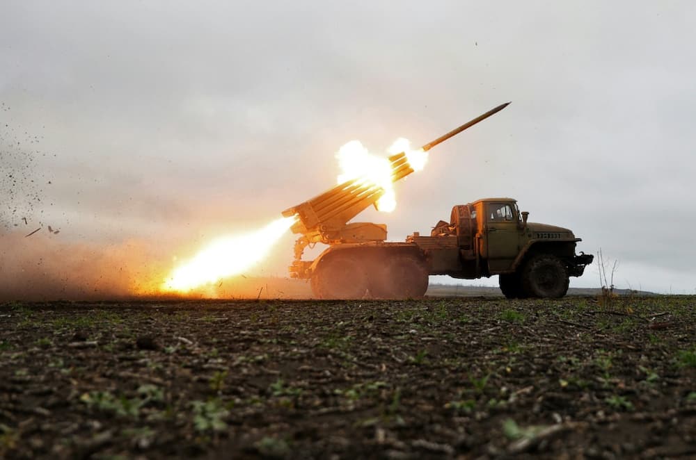 A rocket launcher fires towards Russian positions on the front line in Donetsk