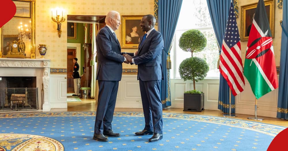 President William Ruto shares a word with US president Joe Biden.