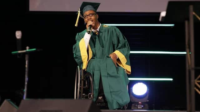 Teen with cerebral palsy evokes emotion as he walks across graduation square
