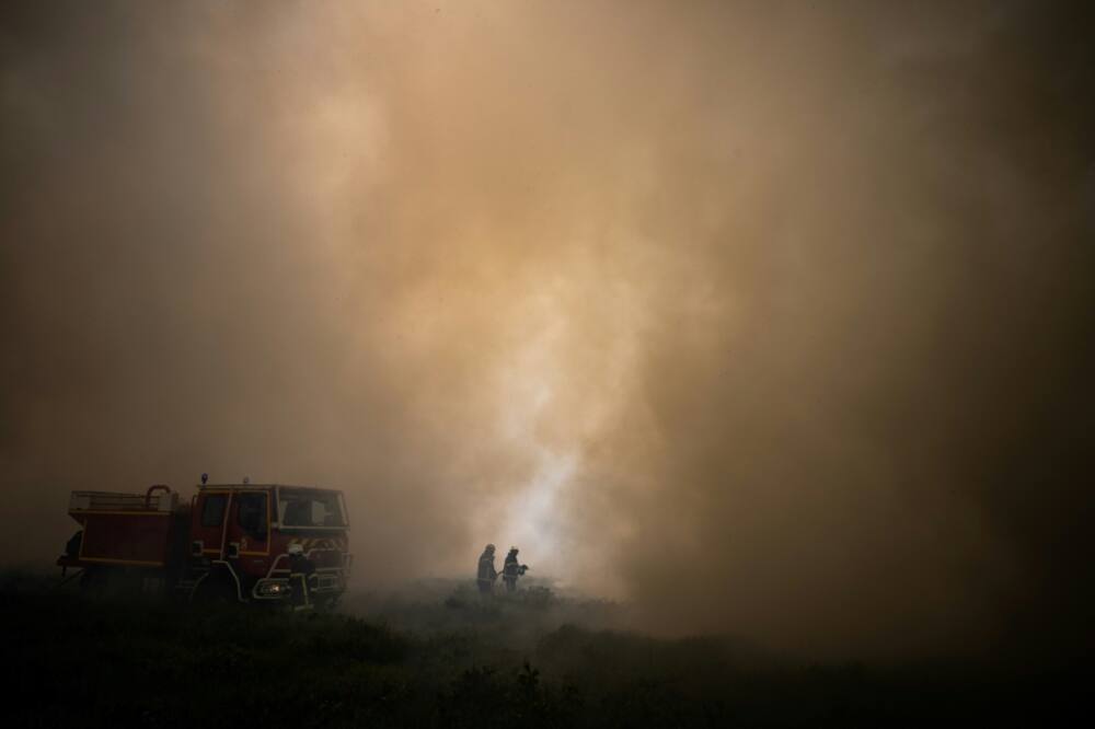 Cooler weather in western France was helping firefighters bring wildfires under control