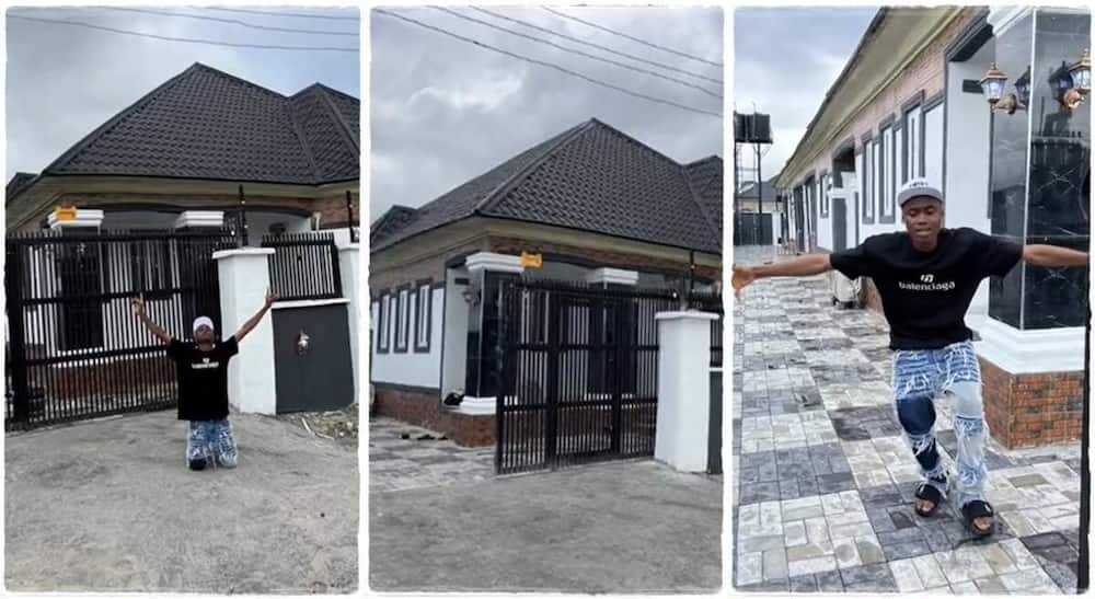 Man celebrates after completing his house.