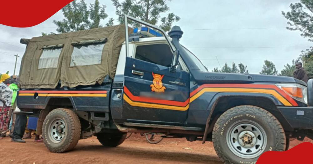 Kenya police vehicle at a scene of crime.