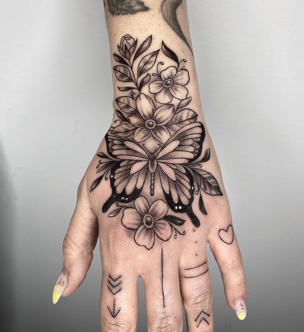 25 beautiful butterfly hand tattoos for girls with meanings in 2022 -  