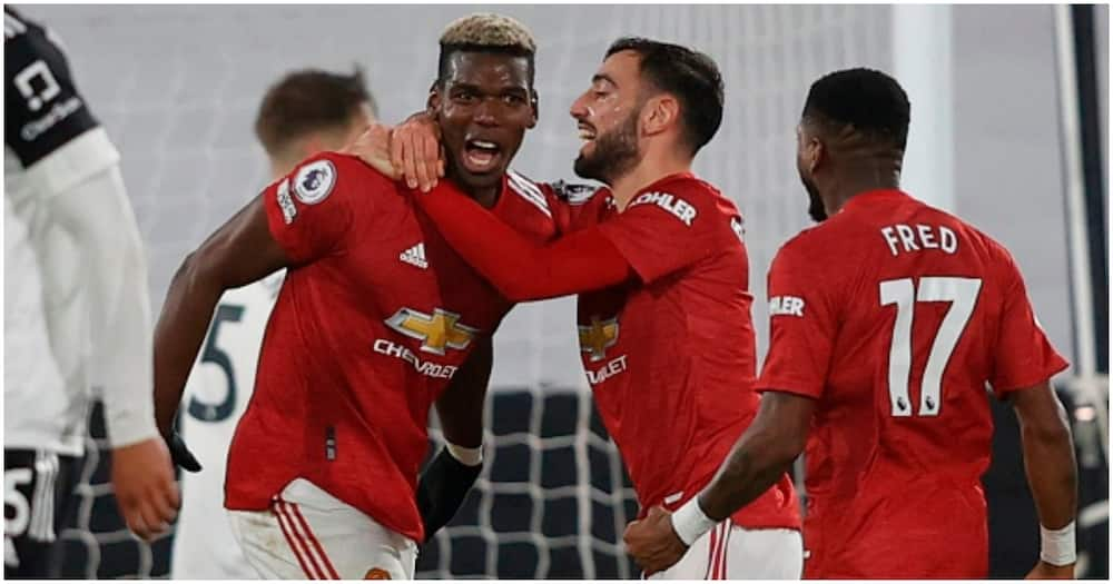 Pogba celebrates with teammates while in action for Man United. Photo: Getty Images.