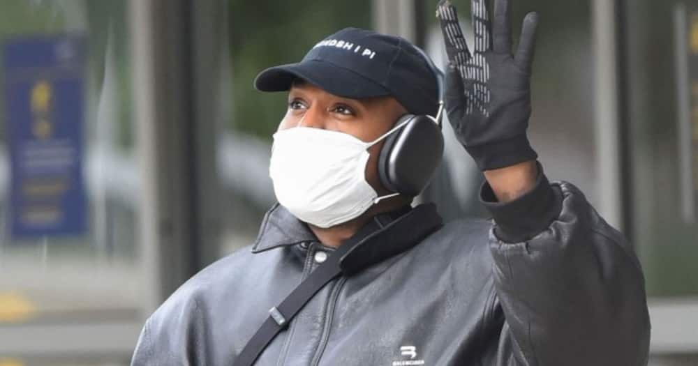 Kanye West spotted wearing weird mask.