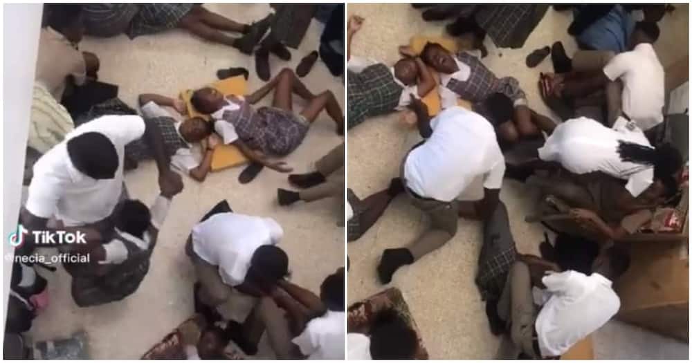 Oberlin High School, Jamaica, students collapse during devotion.