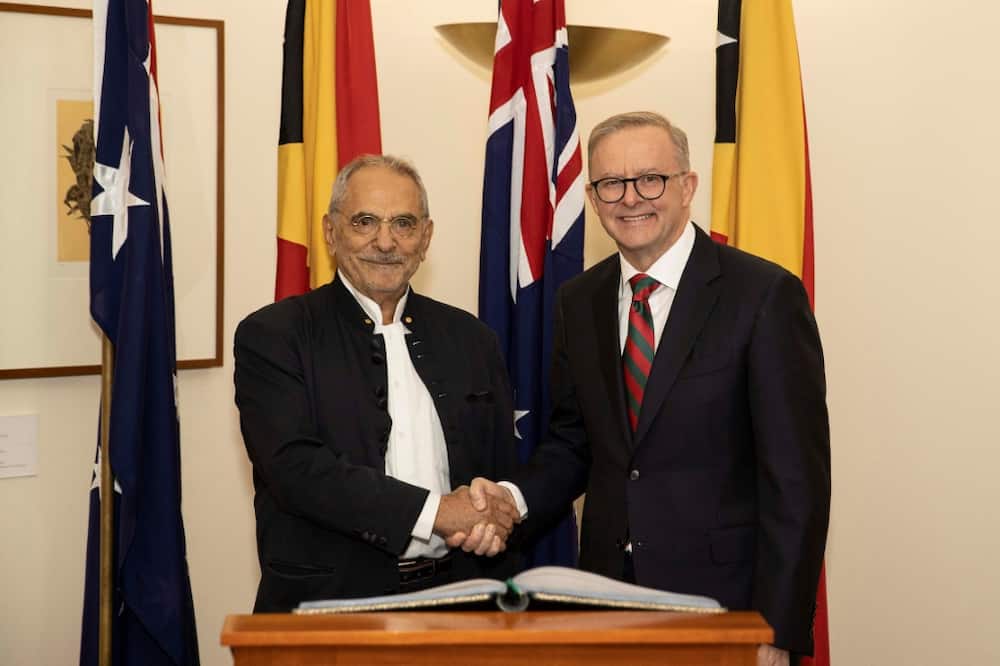 East Timor President Jose Ramos-Horta (L) shakes hands with Australia's Prime Minister Anthony Albanese in Canberra on Wednesday