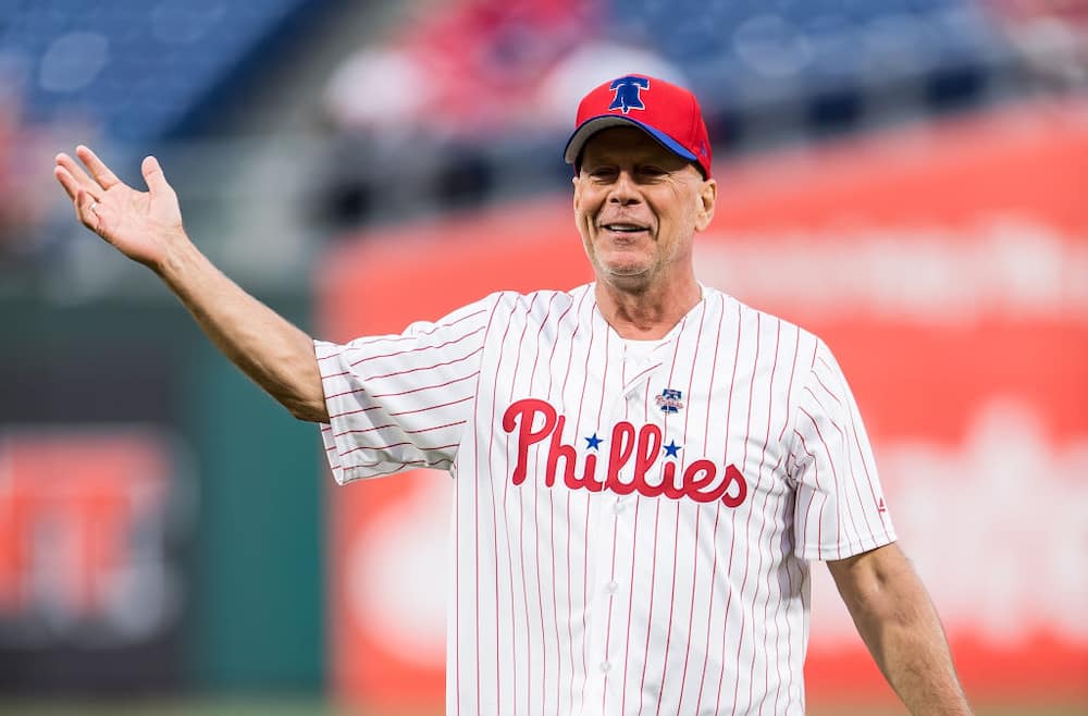 Bruce Willis throws ceremonial pitch at the Milwaukee Brewers v Philadelphia Phillies game