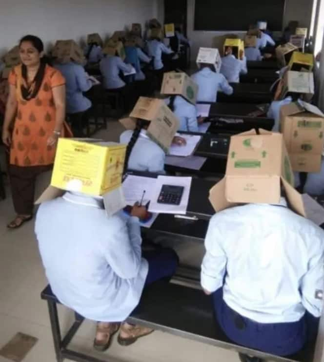 School forces students to wear boxes on their heads in bid to curb cheating during exams