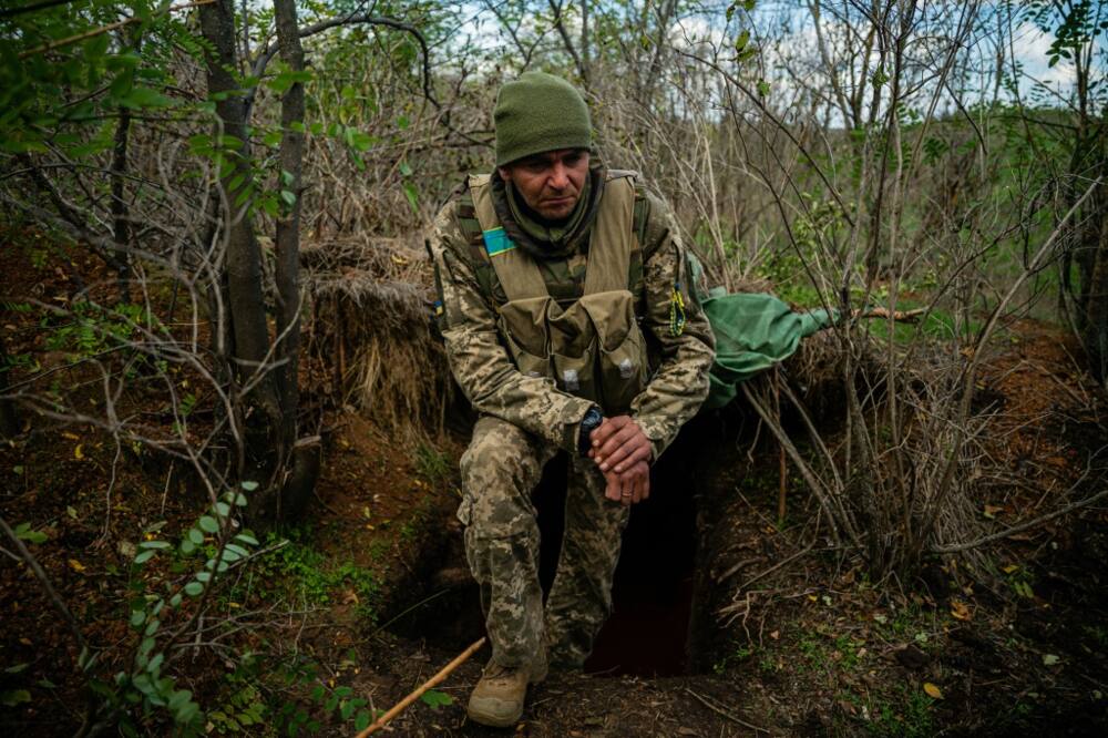 Ukrainian soldier Viktor, 35, stands at a position along the front line in the Mykolaiv region