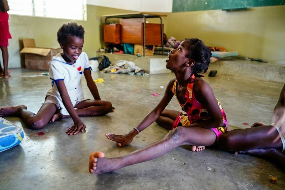 Children who have fled gang violence shelter in a Catholic school in Haiti's capital Port-au-Prince