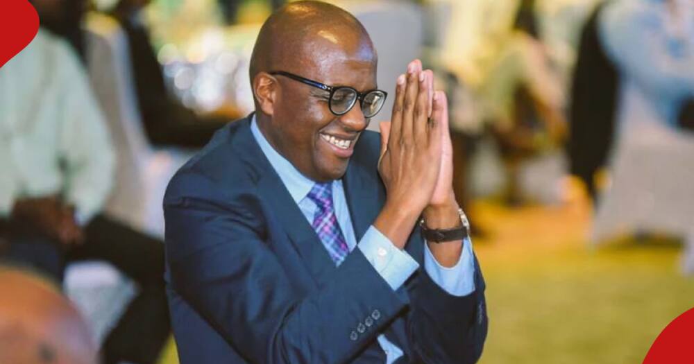 Polycarp Igathe gesturing a prayer. He has joined Tiger Brands as a director.