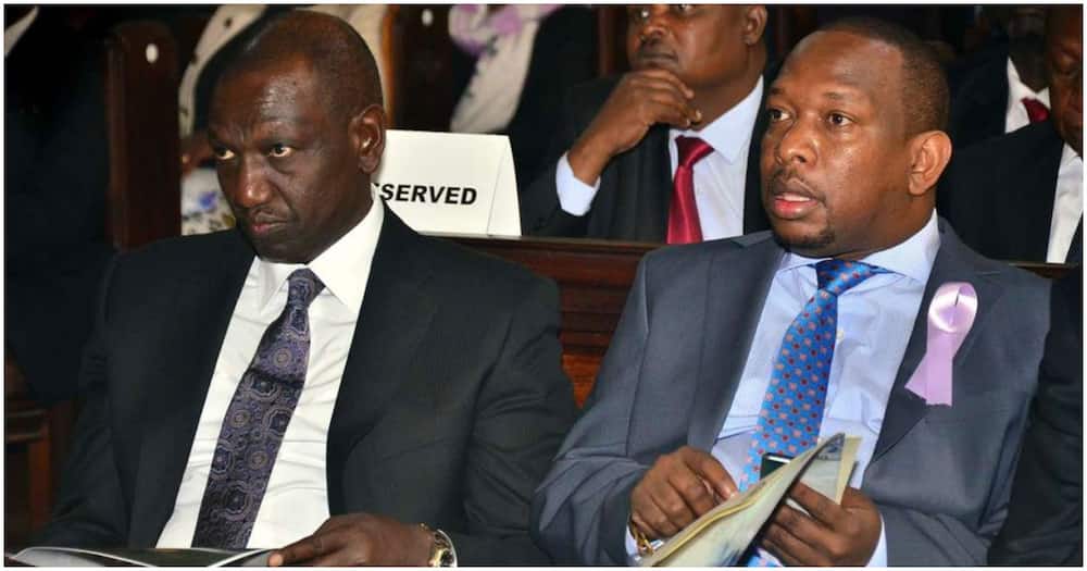 William Ruto seated with Mike Sonko