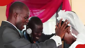 Reactions as Prayerful Groom Lays Hands on His Newlywed Bride, Casts Out Demons in Tongues