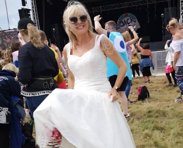 Woman wears wedding dress out regularly to get her money's worth