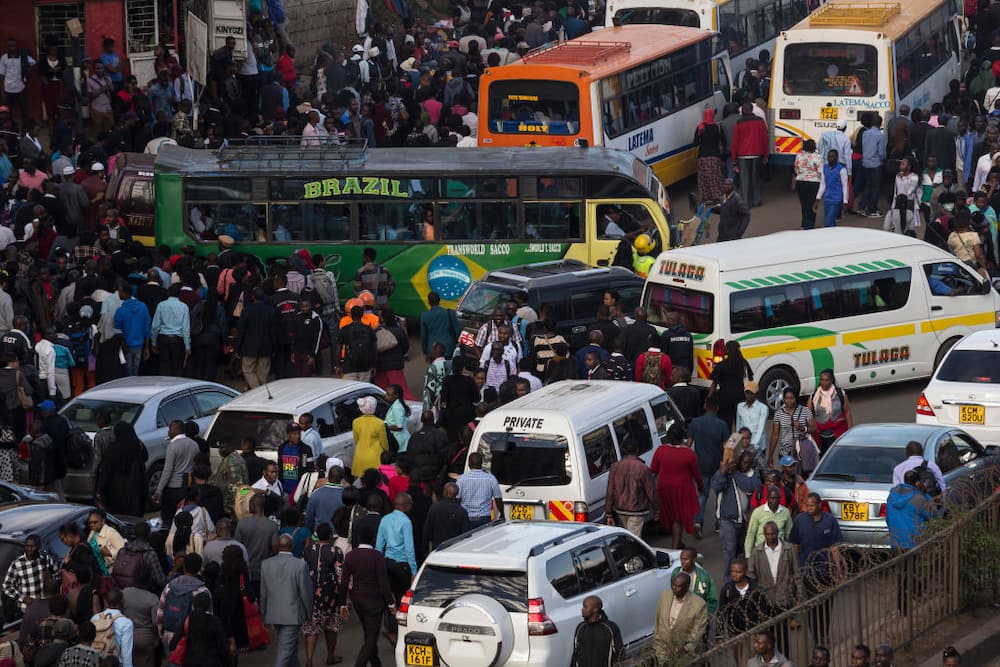 People boading Matatu