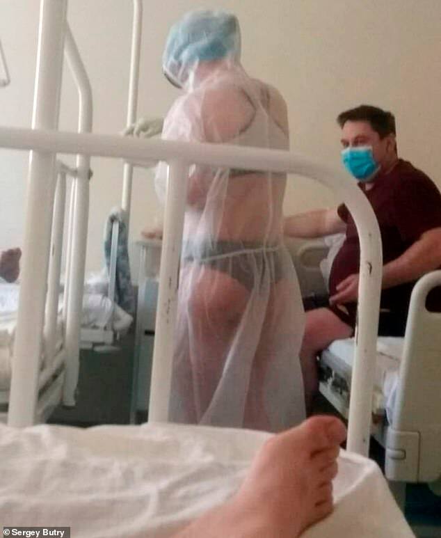 Nurse who was punished for wearing transparent PPE in male ward lands lucrative modeling job