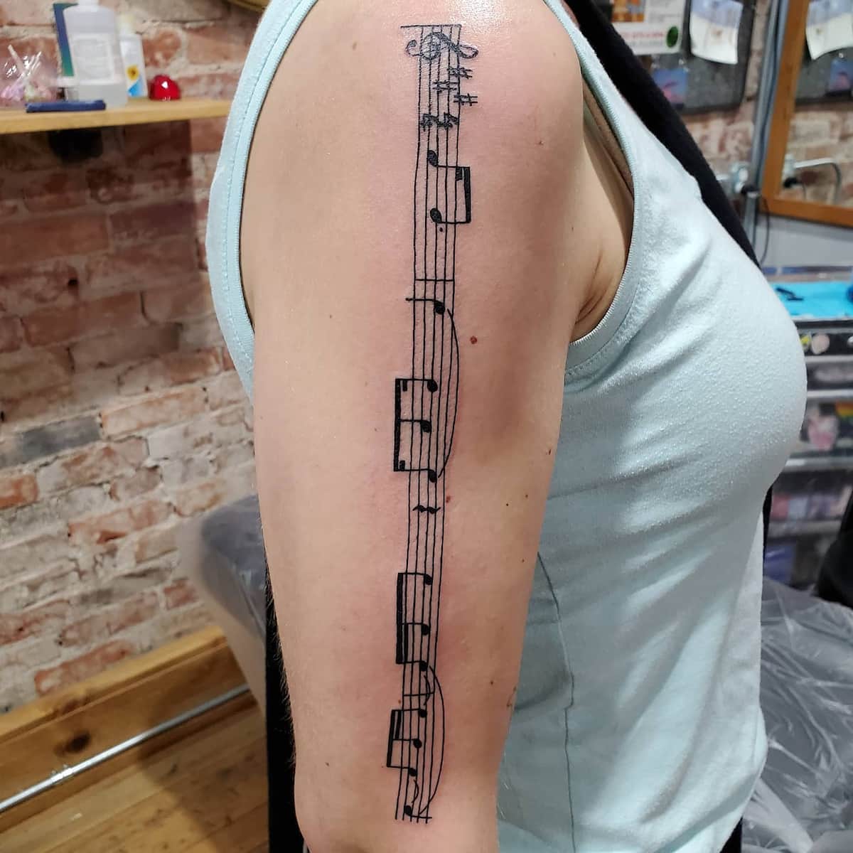 Tattoo uploaded by Lukas Petraitis • #music #musictattoo #band #sheetmusic  #notes #piano #pianosheet #lithuanian #ciurlionis #fineline #black  #minimalistic #forearm #forearmtattoo • Tattoodo