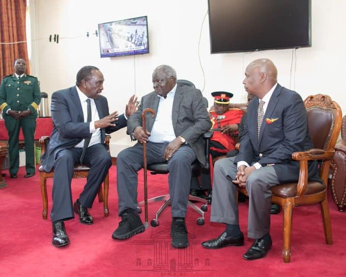 Mwai Kibaki's unusual shoe during Moi's body viewing elicits reactions online