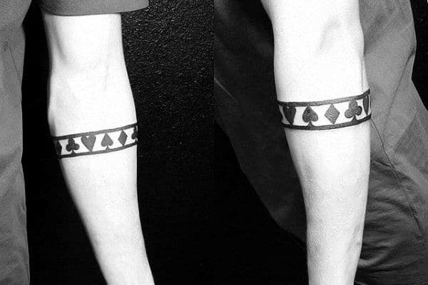 Stone Roman Numerals Arm Band Tattoo - Black Rose Tattoo Shop