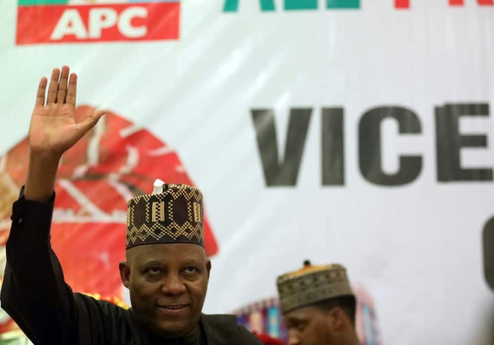 Nigeria’s All Progressive Congress (APC) ruling party Kashim Shettima salutes during a meeting to unveil him as its Vice-Presidential flagbearer in Abuja on July 20, 2022.
