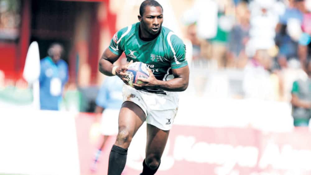 Rugby star Dennis Ombachi hilariously shows infant son how govt will take his money