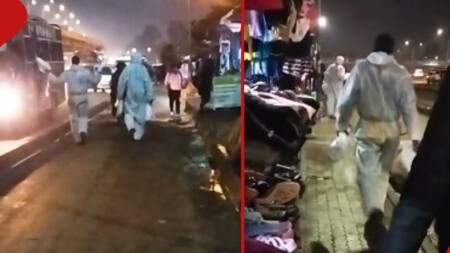 Video of Hawkers Selling PPEs as Raincoats Amuses Netizens: "Bora it's Waterproof"