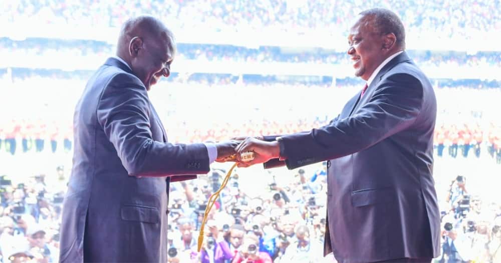 William Ruto receives the instruments of power.