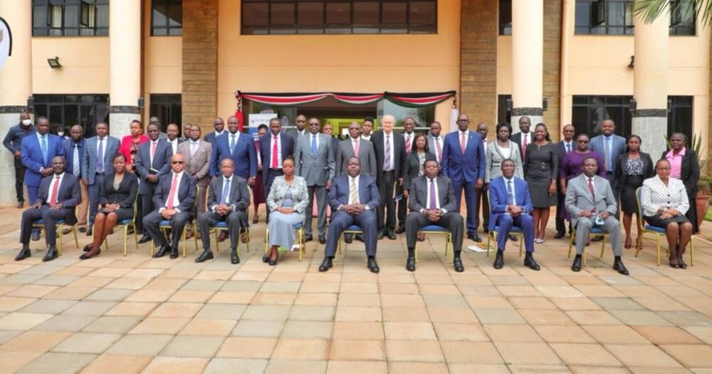 The Kenya Power team with CSs Fred Matian'gi and Monica Juma.