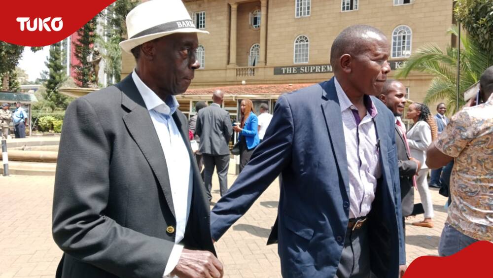 Lawyer Paul Muite (in white cap) at the Supreme Court duing the LSK elections day