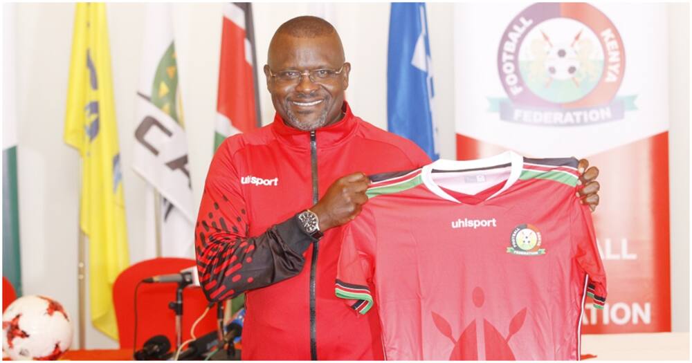 Mulee poses with a Harambee Stars shirt after he was appointed as head coach in October 2020. Photo: Twitter/Football Kenya Federation.