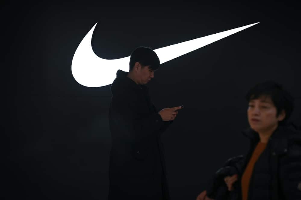 Nike reported lower sales in North America and China and projected flat to slightly higher sales amid inflation, the strong dollar and other headwinds