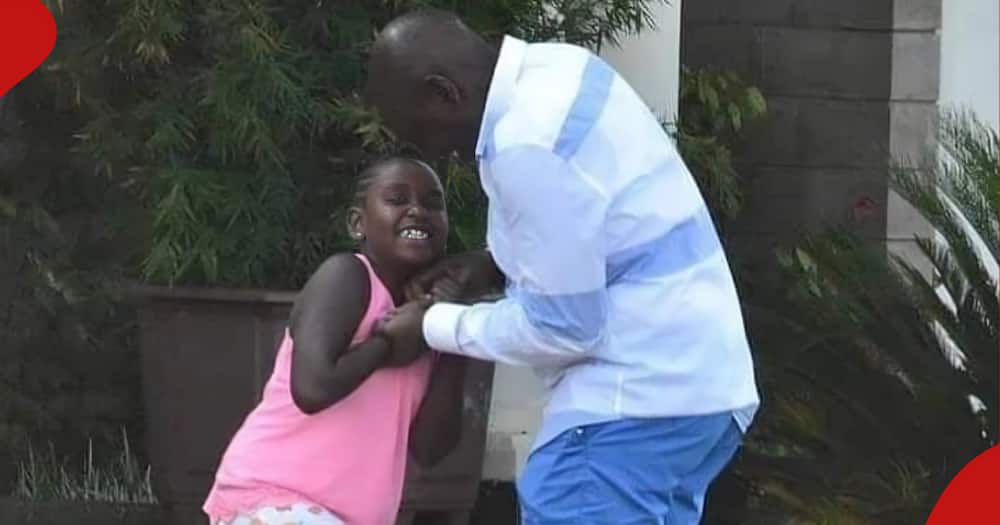 President Ruto playing with daughter Nadia.