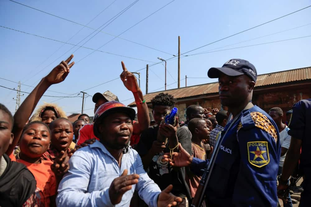 Anti-Rwanda protestors gathered near the border post after the shooting incident