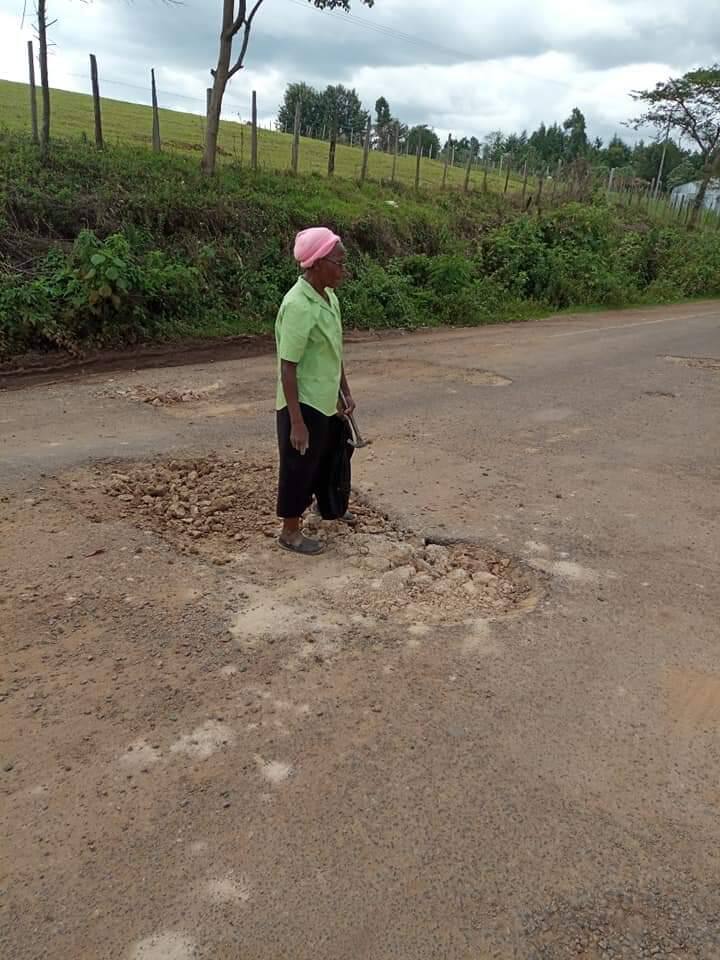 Image result for BOMET WIDOW FILLING POTHOLES