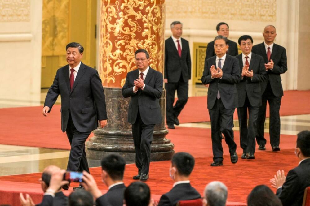 President Xi Jinping (L) has centralised and personalised power more than any Chinese leader since Mao Zedong, analysts say