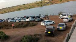 Juja Dam: Netizens Amused by Undated Photo of Kenyans Partying at Precarious Site