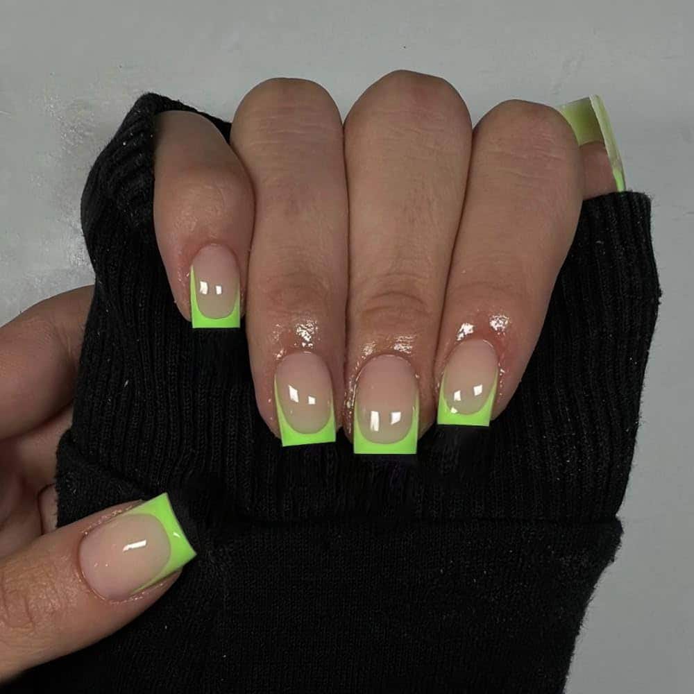 Neon tip St. Patrick's Day nail design. Photo: @Byrdie