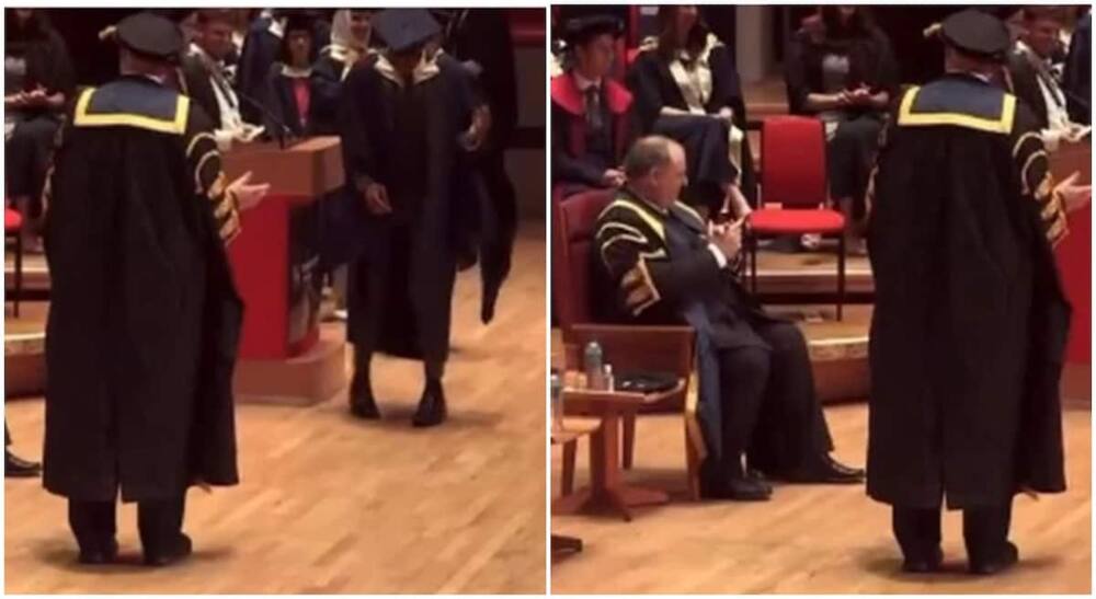 Photo of black man dancing in front of white professors as he graduates from university.