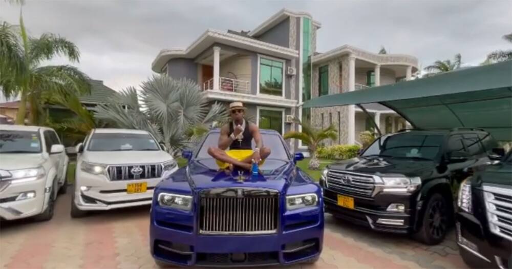 Diamond Platnumz atop his Rolls Royce.