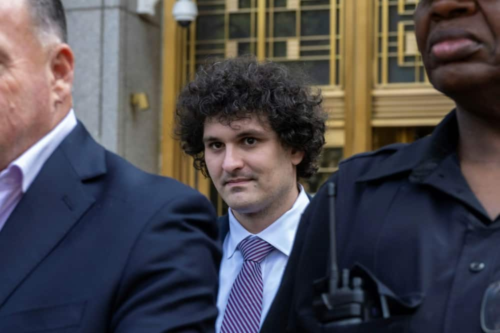 Former FTX chief Sam Bankman-Fried leaves a federal courthouse following a bail hearing ahead of his October trial, in New York