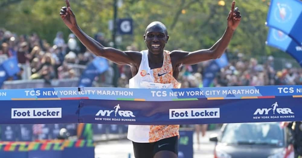 Geoffrey Kamworor of Kenya crosses the finish line to win the Professional Men's Finish during the 2019 TCS New York City Marathon in New York on November 3, 2019. (Photo by TIMOTHY A. CLARY/AFP via Getty Images)