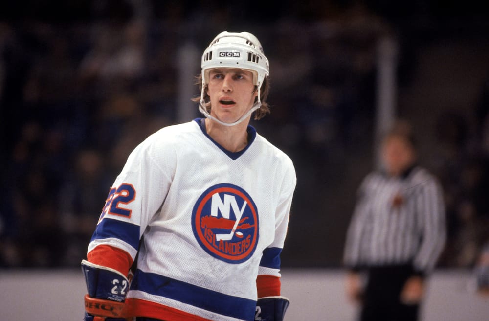 Mike Bossy #22 of the New York Islanders skates